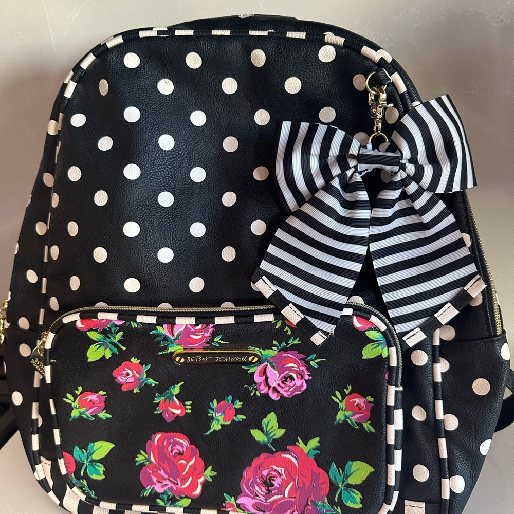 Betsy Johnson backpack with polkadots, stripes roses, and a large bow. NWOT